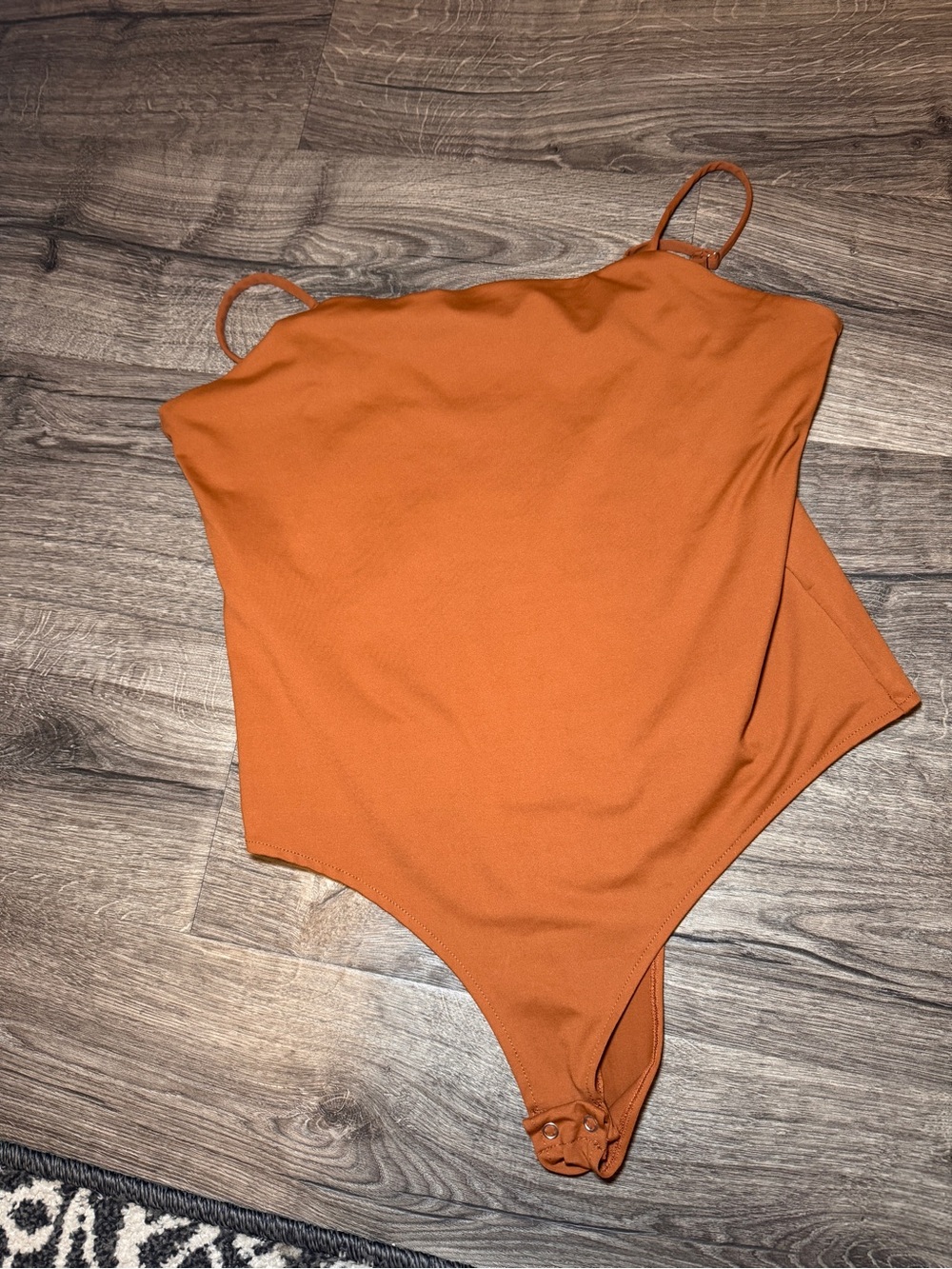 Body Suit in Rust Orange color